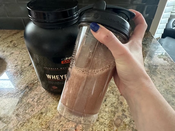 gnc amp wheybolic protein powder in shake
